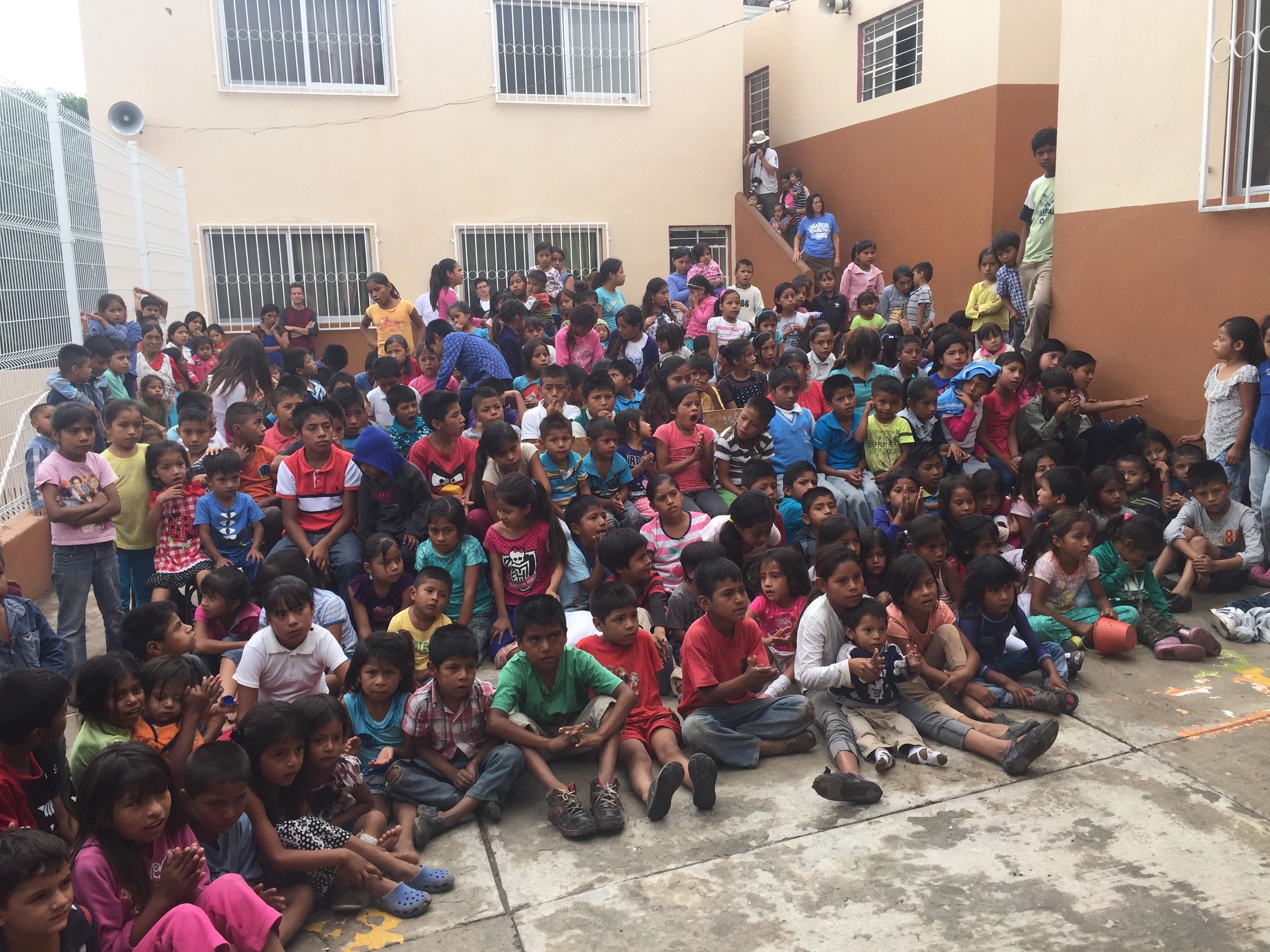 A large group of children gathered at an outreach in Mexico